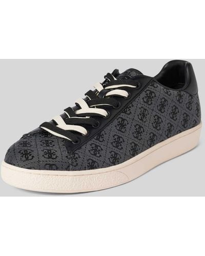 Guess Sneaker mit Allover Label-Muster Modell 'NOLA' - Schwarz
