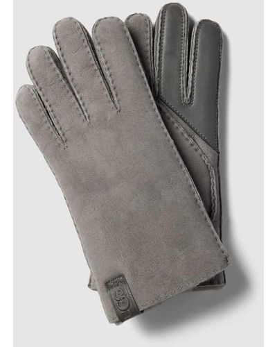 UGG Handschuhe aus Lammfell mit Label-Patch - Grau