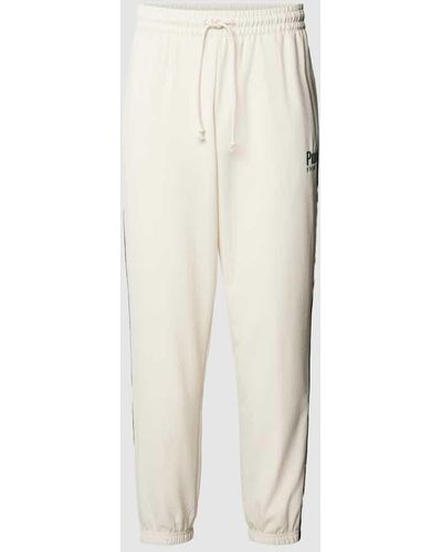 PUMA Sweatpants mit Logo-Stitching - Weiß