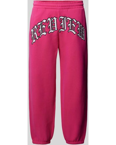 Review Regular Fit Sweatpants mit Label-Stitching - Pink