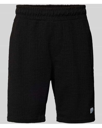 PEGADOR Regular Fit Sweatshorts mit Label-Stitching Modell 'LIBCO' - Schwarz