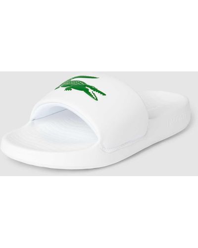 Lacoste Sandalette mit Label-Print Modell 'SERVE SLIDE 1.0' - Weiß