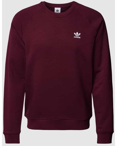 adidas Originals Sweatshirt mit Raglan-Ärmeln Modell 'ESSENTIAL CREW' - Lila
