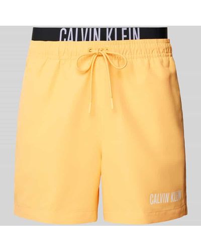 Calvin Klein Badehose mit elastischem Label-Bund - Gelb