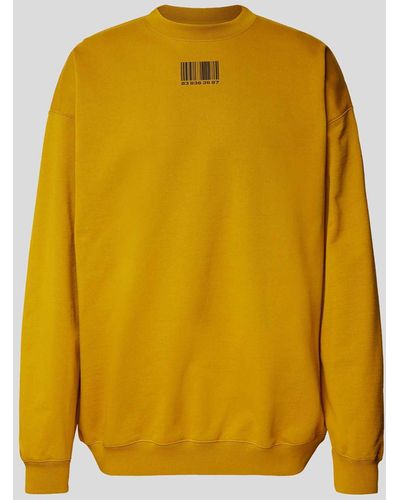 VTMNTS Oversized Sweatshirt mit Motiv-Print - Gelb