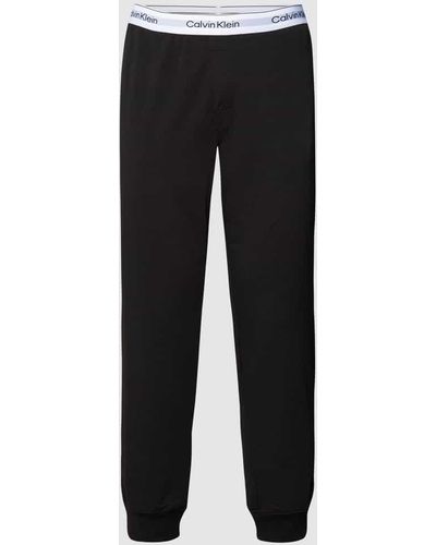 Calvin Klein Sweatpants mit elastischem Logo-Bund Modell 'JOGGER' - Schwarz