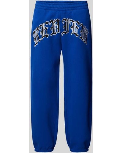 Review Regular Fit Sweatpants mit Label-Stitching - Blau