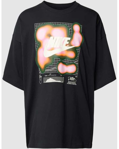 Nike T-Shirt mit Label-Print - Schwarz