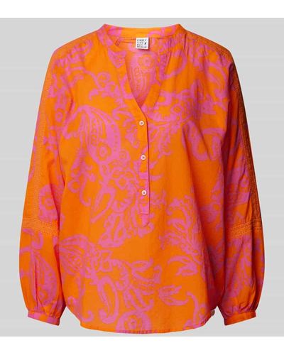 Emily Van Den Bergh Bluse mit Allover-Muster und V-Ausschnitt - Orange