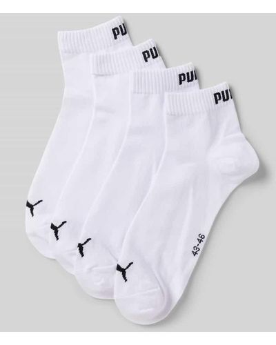 PUMA Socken mit Label-Schriftzug im 4er-Pack - Weiß