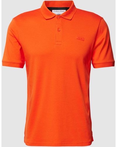 Calvin Klein Slim Fit Poloshirt Van Katoen Met Labeldetail - Oranje