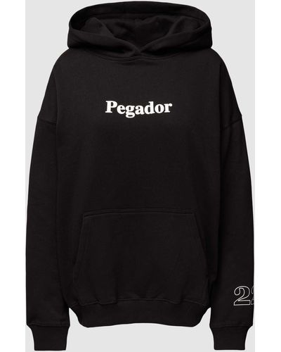 PEGADOR Oversized Hoodie Met Extra Brede Schouders - Zwart