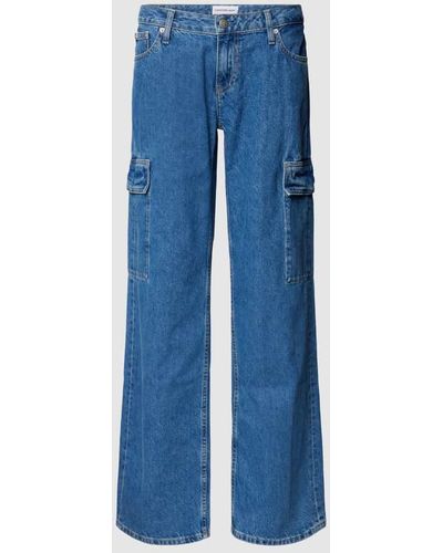 Calvin Klein Extreme Low Rise Baggy Fit Jeans mit Cargotaschen - Blau