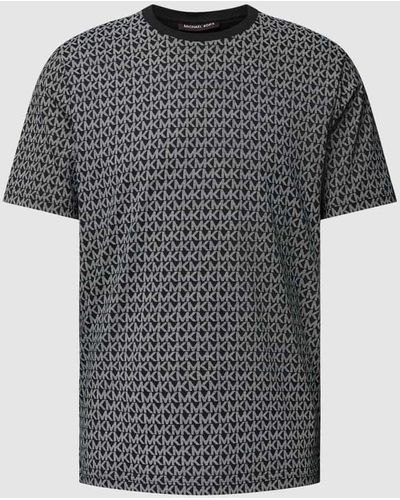 Michael Kors T-Shirt mit Allover-Label-Print - Schwarz