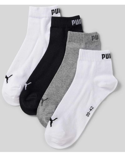 PUMA Socken mit Label-Schriftzug im 4er-Pack - Weiß