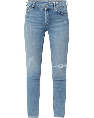 Review Skinny Jeans Met Stretch - Blauw