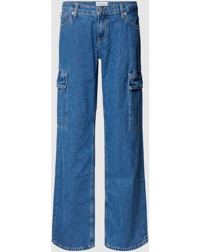 Calvin Klein Extreme Low Rise baggy Fit Jeans Met Cargozakken - Blauw
