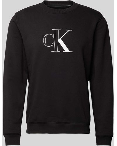 Calvin Klein Sweatshirt mit Label-Print Modell 'OUTLINE' - Schwarz