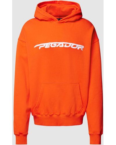 PEGADOR Oversized Hoodie mit Label-Stitching Modell 'MANOR' - Orange