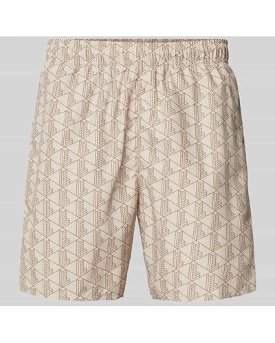 Lacoste Regular Fit Shorts mit Allover-Label-Muster - Natur