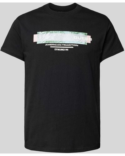 Guess T-Shirt mit Label-Print - Schwarz