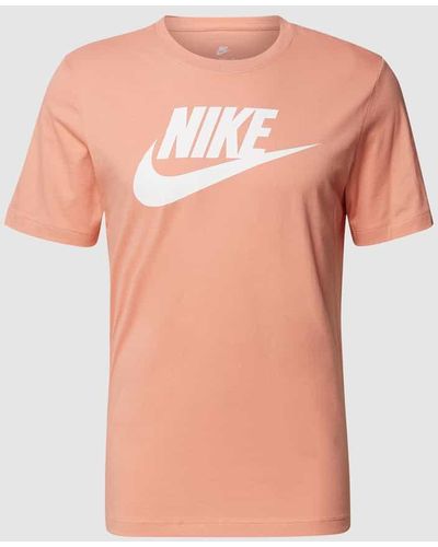 Nike T-Shirt mit Label-Print - Pink
