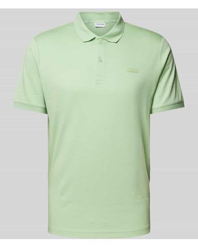 Calvin Klein Regular Fit Poloshirt mit Knopfleiste - Grün