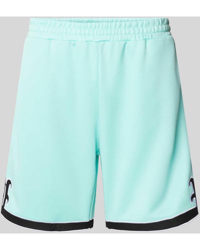 Review Shorts mit elastischem Bund - Grün