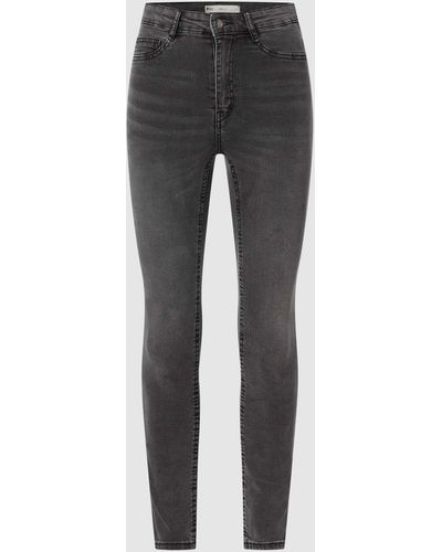 Gina Tricot Skinny Fit High Waist Jeans mit Stretch-Anteil Modell 'Molly' - Grau