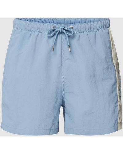 Ellesse Shorts mit seitlichen Eingrifftaschen - Blau