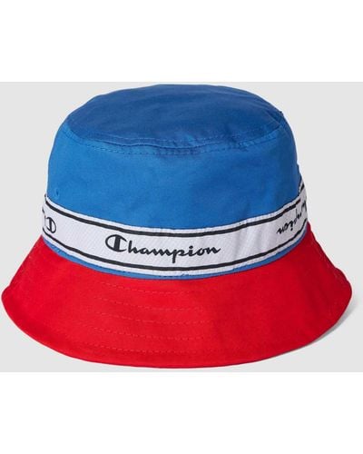 Champion Bucket Hat mit Kontraststreifen und Brand-Schriftzug - Rot