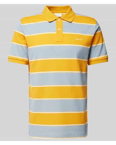 GANT Slim Fit Poloshirt mit Blockstreifen - Gelb