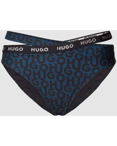 HUGO Bikini-Hose mit Allover-Logo Modell 'CLASSIC MONOGRAM Cut Out' - Blau