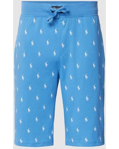 Polo Ralph Lauren Slim Fit Sweatshorts mit Allover-Logo-Muster Modell 'LIQUID COTTON' - Blau