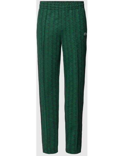 Lacoste Regular Fit Sweatpants mit grafischem Allover-Muster - Grün