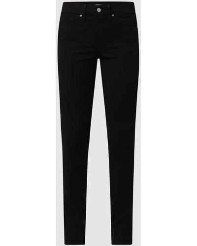 Levi's® 300 Shaping Super Skinny Fit Jeans mit Stretch-Anteil Modell 310 - 'Water - Schwarz