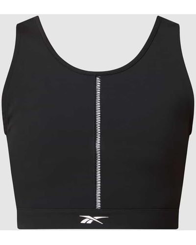 Reebok Crop Top mit Kontrasteinsätzen - Schwarz