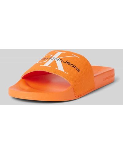 Calvin Klein Slides mit Label-Print Modell 'MONOGRAM' - Orange