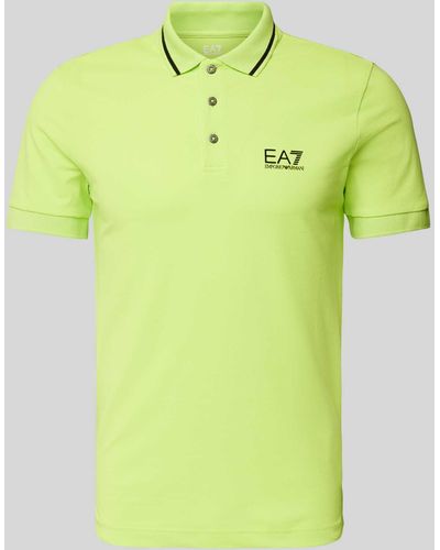 EA7 Slim Fit Poloshirt mit Label-Print - Gelb