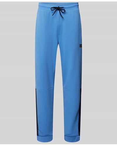 EA7 Sweatpants mit Label-Print Modell 'NATURAL' - Blau