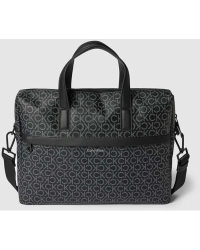 Calvin Klein Laptoptasche mit Logo-Muster - Schwarz