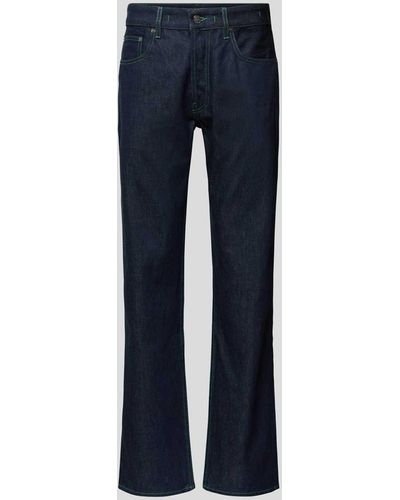 Jacquemus Bootcut Jeans mit Label-Patch - Blau
