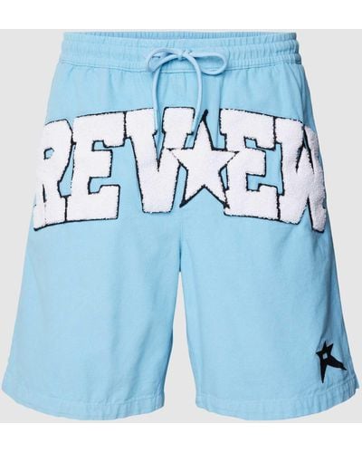Review Baggy Shorts im College Star Style - Blau