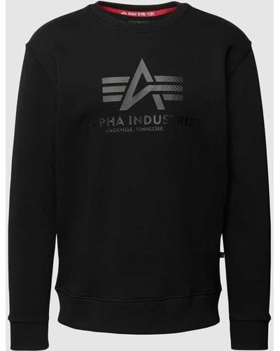 Alpha Industries Sweatshirt mit Label-Print Modell 'CARBON' - Schwarz