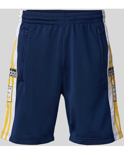 adidas Originals Korte Regular Fit Trainingsbroek Met Ritszakken - Blauw