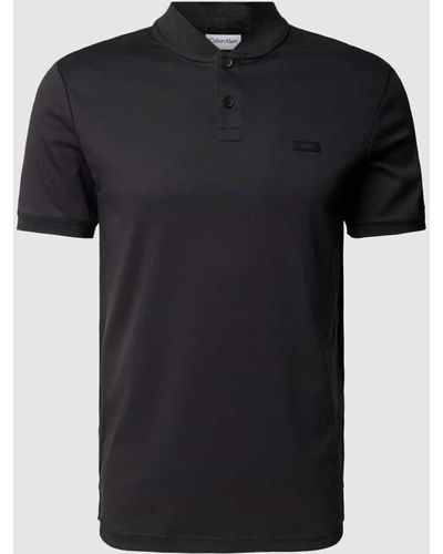 Calvin Klein Slim Fit Poloshirt mit Stehkragen - Schwarz