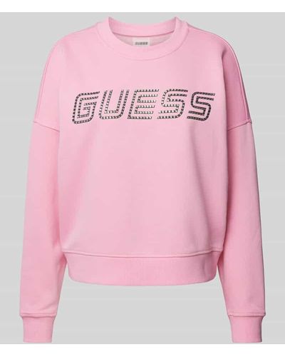 Guess Sweatshirt mit überschnittenen Schultern und Label-Print - Pink