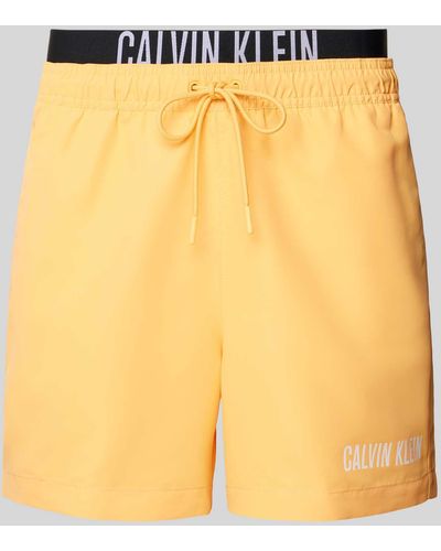 Calvin Klein Badehose mit elastischem Label-Bund - Gelb