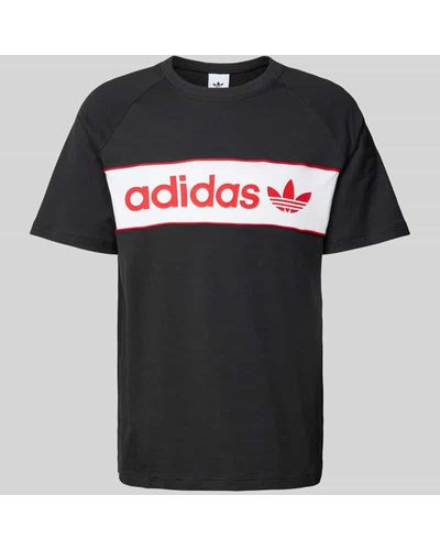adidas Originals T-Shirt mit Label-Print - Schwarz