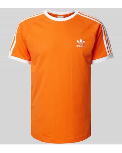 adidas Originals T-Shirt mit Label-Stitching - Orange